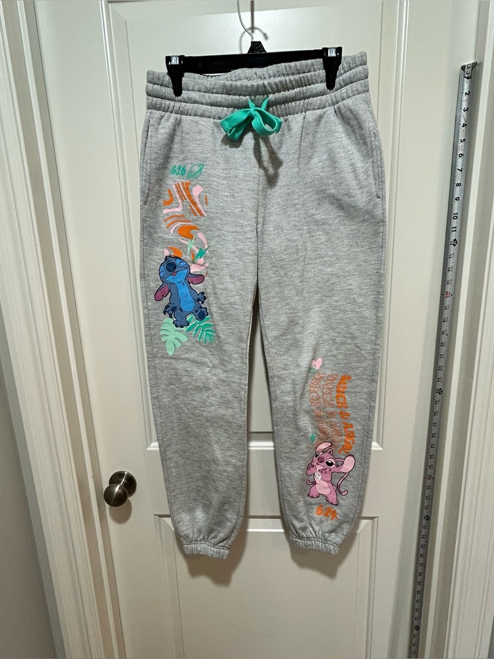 Disney Stitch women’s size M (7/9) Grey Sweatpants with Stitch & Angel Graphics